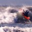 Me attempting to get out and surf kayak in Cayucos, Calif. -- got a good workout, at least ...