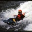 German paddler Martin Bauer playin', this is "down" time from running gnarly creeks, 2002 N.W. USA tour!